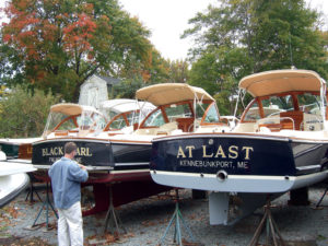 A fleet of new CW Hood Wasque 26s with Hood Navy tops on the hard in Marblehead, Mass.