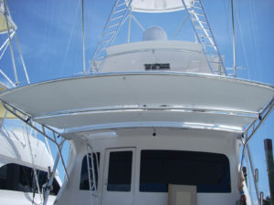 Knowledgeable marine fabricators can select a specialized performance fabric for virtually every need, opening opportunities to bring fresh, new ideas to customers, like this tilting panel aft shade by canvas Designers Inc., which won an International Achievement Award.