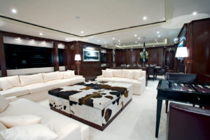 An arrangement of hair-on leather trunks makes a stunning centerpiece in a lounge area of the 147-foot motor yacht "Africa," made by Sunrise Yachts. Interior design by Franck Darnet. Hair-on leather can evoke an exotic setting or the American West, depending upon the overall "look" of an interior. Photo: M.Carlin, LuxMedia Group/Sunrise Yachts.