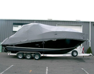 Covers intended to remain in place while the boat is towed on a trailer must withstand abrasion and buffeting at wind speeds approaching hurricane force  (74mph). Photo: Safety Components Fabric Technologies Inc.