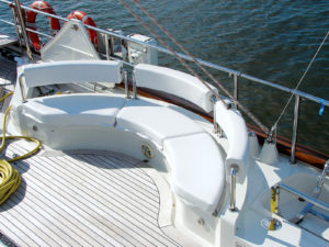 Port and starboard long curved seating on the aft deck.