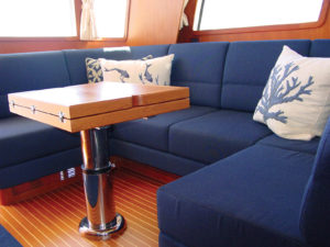 Krisha Plauche, principal designer for Onboard Interiors LLC, Marblehead, Mass., systematically and thoroughly interviews her customers to start the fabric selection process. The first piece of information she gathers from her customers is the type of boat under consideration. Photo: Onboard Interiors LLC.