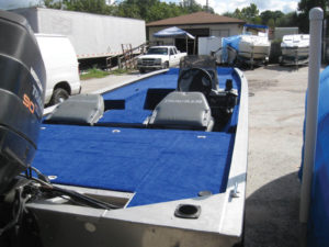 This aluminum bass boat's new sharp blue carpet replaced the original dark gray color, which was too hot and looked dirty all the time.