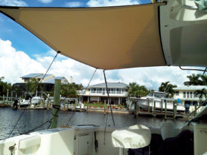 Shading systems might be as uncomplicated as a simple fabric extension from a boat's permanent hard top, but most fabricators design such " add ons" to appear as if they were original equipment.