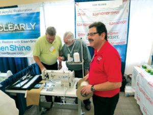 Sam Sloan, Ron Russell and Rich Ludwig in the Sloan Machinery booth at the MFA National Convention at Cape Coral, Fla., earlier this year.