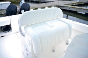 To make the seat more comfortable, 3-inch foam, a bolster and an extra 4 inches were added to the seat depth. The new bucket-like seat is paired with a simple back cushion.