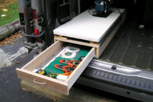 The van is equipped with a drawer storage for supplies and tools. 