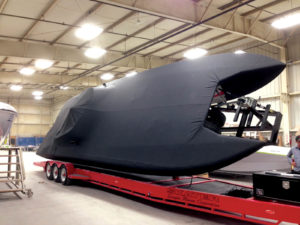 This project, which won a 2015 MFA Award of Excellence, was a custom-fit challenge; every curve and surface had to be patterned so the cover would form to the boat for traveling. The windshield mirrors made sliding on the cover a challenge. Ritsema solved the problem with relief cuts and Velcro® flaps. To prevent the cover from ballooning while traveling, he added multiple sewn-in vents to help release air.