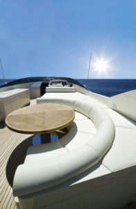 Marine-grade vinyl is the standard choice for exterior cushions and seating, thanks to its versatility in the face of a punishing environment.