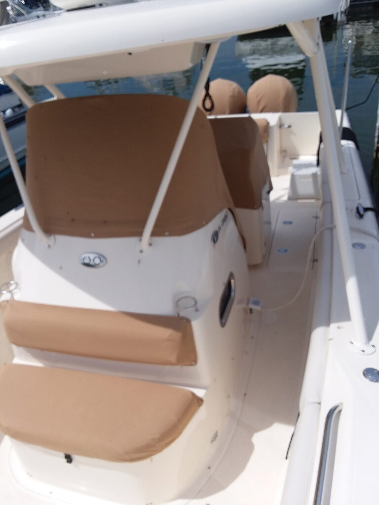 Covers on boat seats and the helm.