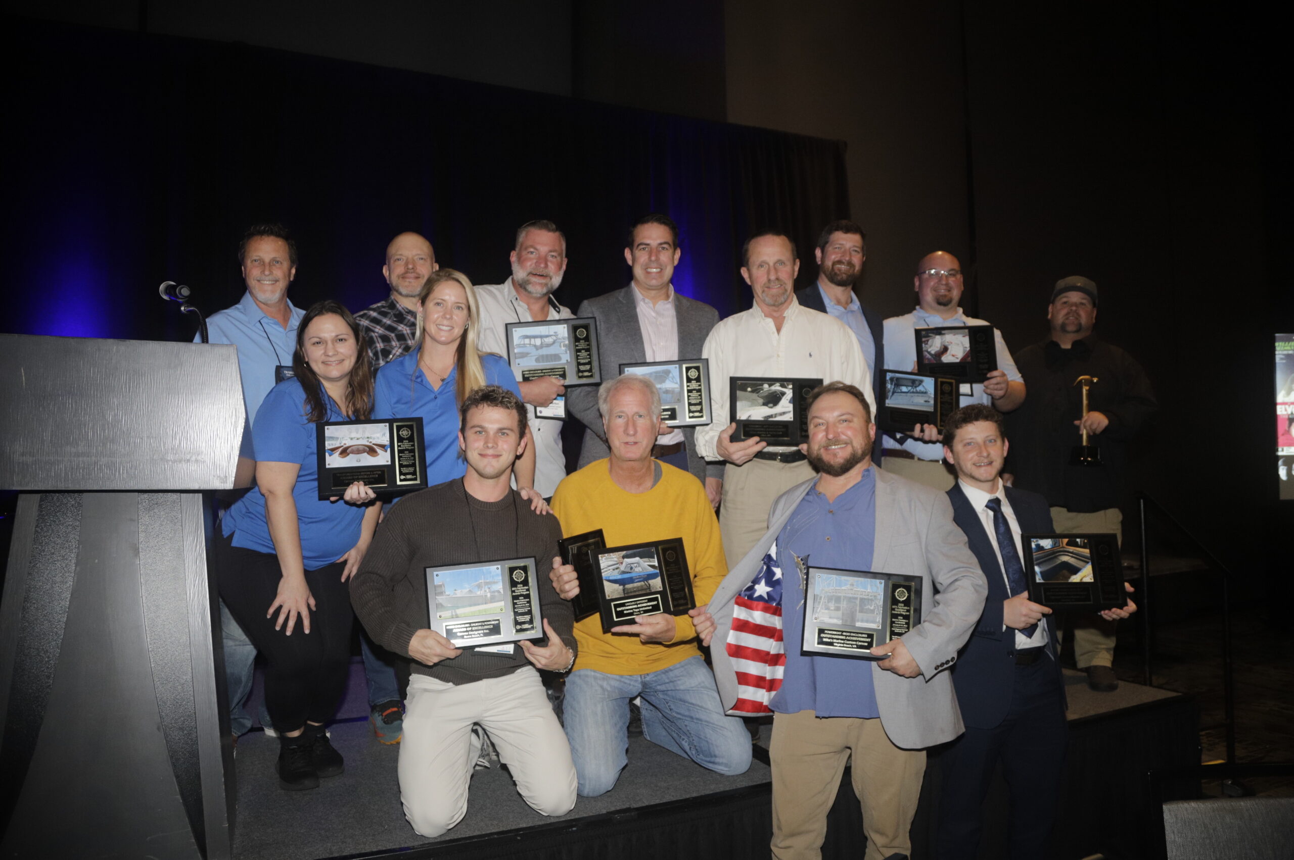 Winners of the 2026 MFA Fabrication Excellence Awards pose with plaques.