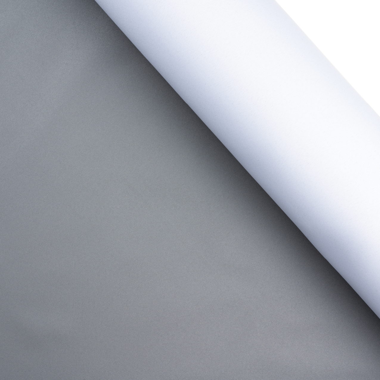 Gray and white fabric roll, partially unrolled, against a bright background.