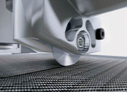 MF_FeaturedImages_254x184px1 Close-up of a precision cutting tool with a circular blade, positioned over a textured surface, showcasing sleek metallic design and sharp details.